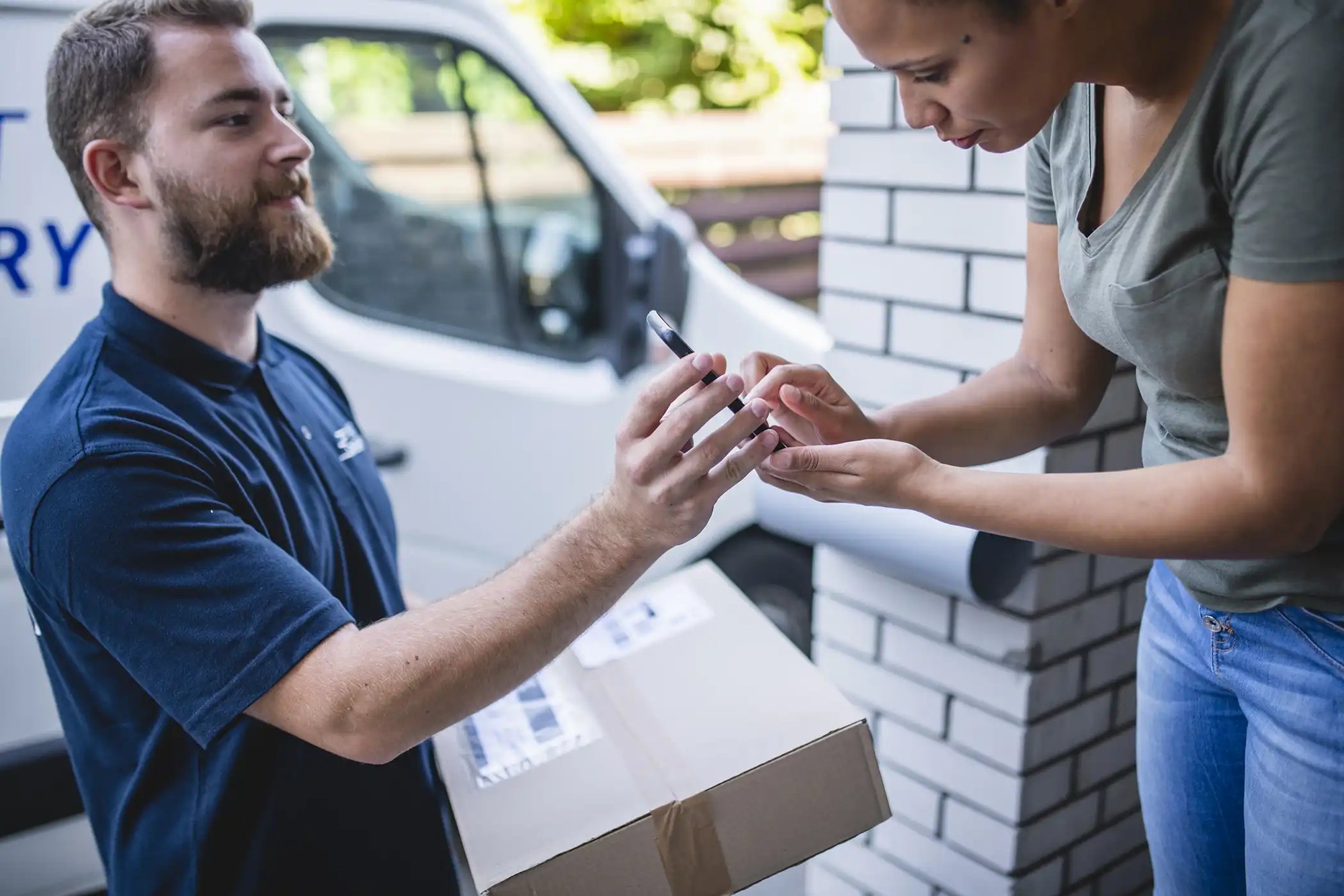 home delivery_male courier female recipient_small
